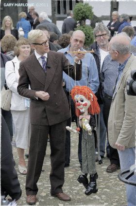 Mark Hill with a Pelham Puppet at an Antiques Roadshow at the Weald & Downland Museum