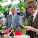 Mark Hill valuing stuffed toys at an Antiques Roadshow at St Fagans