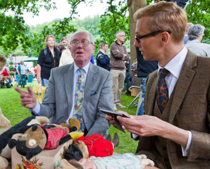Mark Hill valuing stuffed toys at an Antiques Roadshow at St Fagans