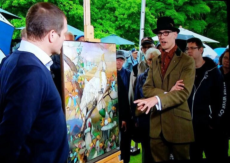 Mark Hill valuing a unique Tiffany panel at an Antiques Roadshow in Towneley Hall