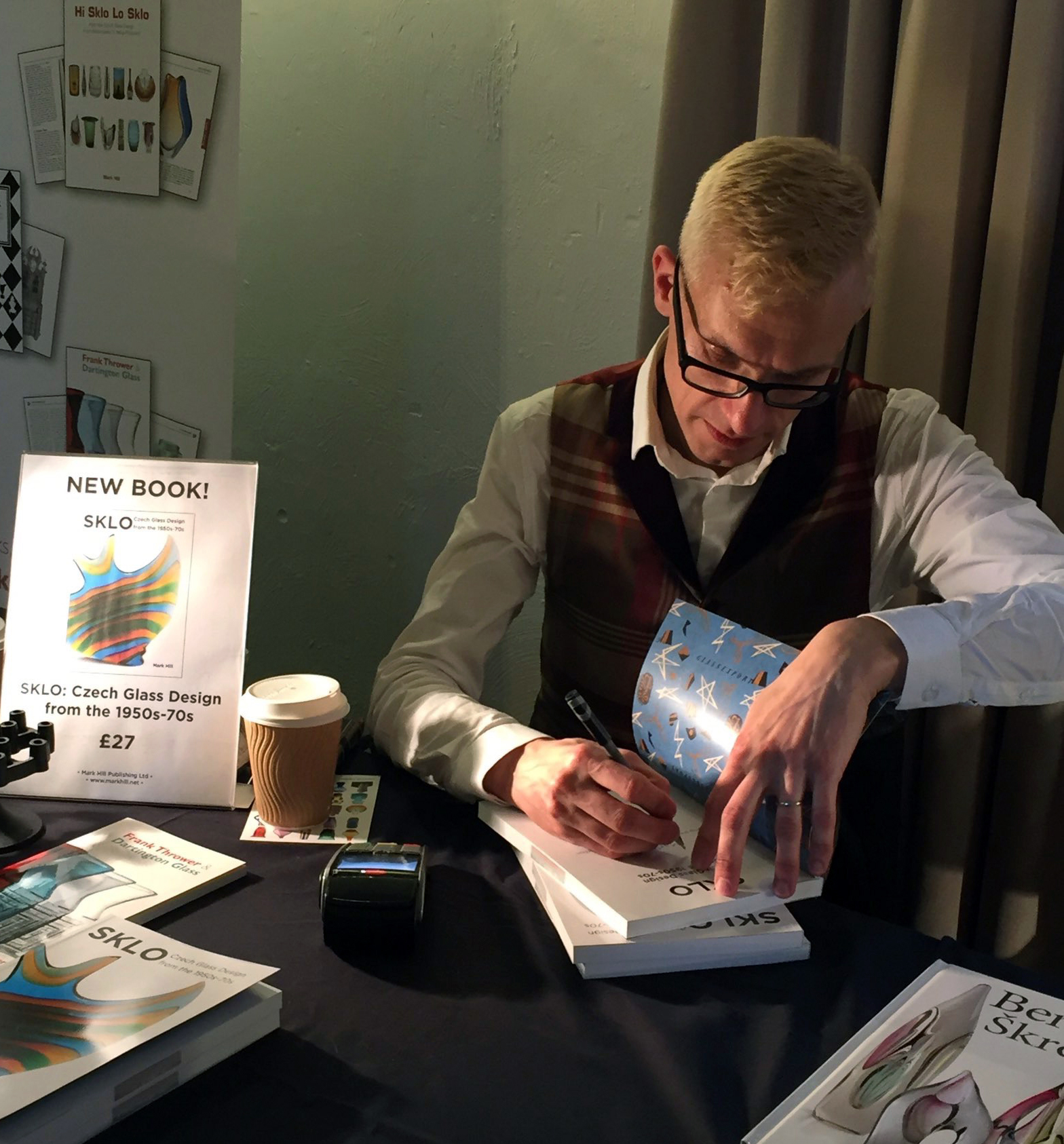 Mark Hill signing Czech glass books at the Cambridge Glass Fair